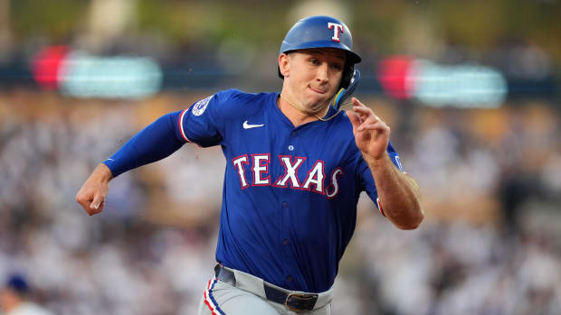 Rookie Wyatt Langford was 4 for 5 and hit for the cycle in the Texas Rangers 11-2 win over the Orioles on Sunday.