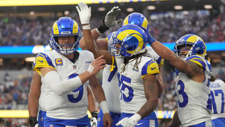 Dec 3, 2023; Inglewood, California, USA; Los Angeles Rams wide receiver Demarcus Robinson (15) celebrates with quarterback Matthew Stafford (9) and running back Kyren Williams (23) after catching a 7-yard touchdown pass in the third quarter against the Cleveland Browns at SoFi Stadium. Mandatory Credit: Kirby Lee-USA TODAY Sports