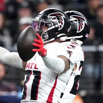 Dec 16, 2024; Paradise, Nevada, USA; Atlanta Falcons safety Justin Simmons (31) celebrates after intercepting a pass against the Las Vegas Raiders in the second half at Allegiant Stadium. Mandatory Credit: Kirby Lee-Imagn Images