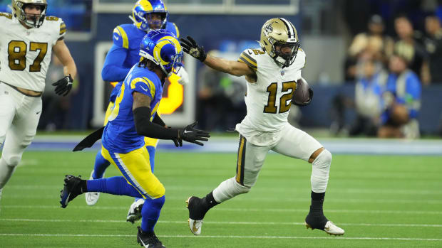 New Orleans Saints wide receiver Chris Olave (12) runs after a catch against the Los Angeles Rams 