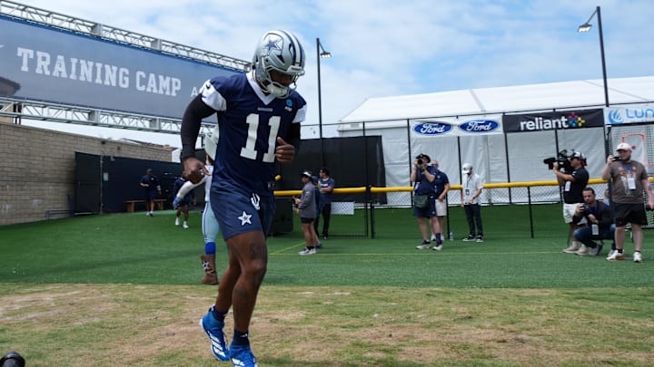 Dallas Cowboys defensive end Micah Parsons enters the field during training camp at the River Ridge Fields. 