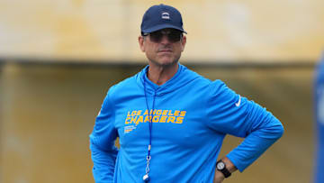 Chargers head coach Jim Harbaugh looks on during training camp