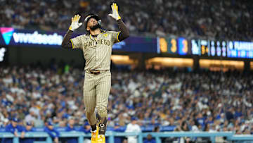 Sep 25, 2024; Los Angeles, California, USA; San Diego Padres right fielder Fernando Tatis Jr. (23) celebrates after hitting a solo home run in the fifth inning against the Los Angeles Dodgers at Dodger Stadium. Mandatory Credit: Kirby Lee-Imagn Images