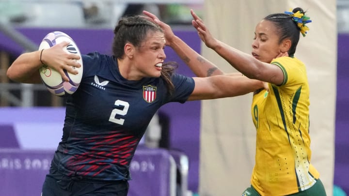 United States forward Ilona Maher carries the ball against Brazil back Gabriela Lima during the Paris 2024 Olympic Summer Games at Stade de France. 