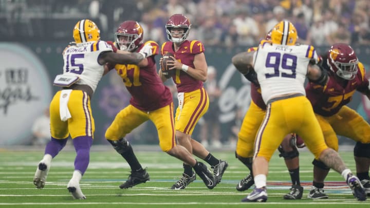 Sep 1, 2024; Paradise, Nevada, USA; Southern California Trojans quarterback Miller Moss (7) drops back to throw the ball against the LSU Tigers in the first half  at Allegiant Stadium. 