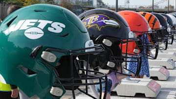 Oct 7, 2023; London, United Kingdom; Large oversized helmets of the New York Jets Baltimore Ravens, Cleveland Browns and Cincinnati Bengals at the NFL Experience London at the Battersea Power Station. Mandatory Credit: Kirby Lee-Imagn Images