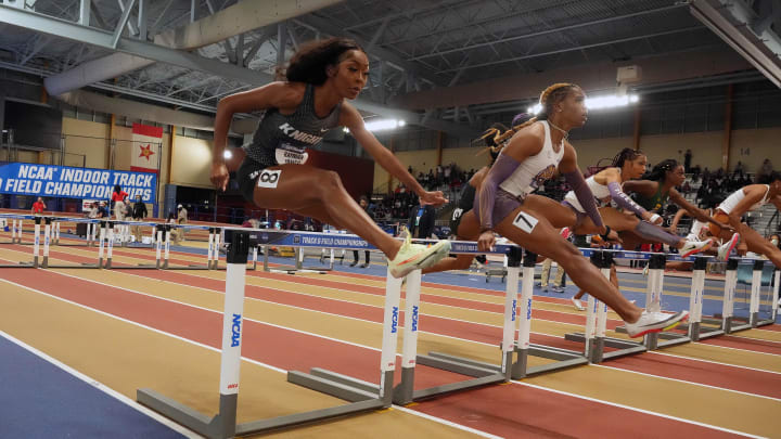 Mar 11, 2022; Birmingham, AL, USA; Rayniah Jones of UCF and Alia Armstrong of LSU run in a women's 60m heat during the NCAA Indoor Track and Field Championships at Crossplex. Mandatory Credit: Kirby Lee-USA TODAY Sports