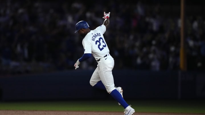 Aug 20, 2024; Los Angeles, California, USA; Los Angeles Dodgers right fielder Jason Heyward (23) runs the bases after hitting a three-run home run in the eighth inning against the Seattle Mariners at Dodger Stadium. 