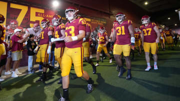 Oct 21, 2023; Los Angeles, California, USA; Southern California Trojans players enter the field before the game against the Utah Utes at United Airlines Field at Los Angeles Memorial Coliseum. Mandatory Credit: Kirby Lee-USA TODAY Sports