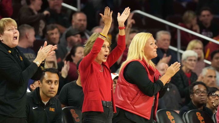 Nov 14, 2023; Los Angeles, California, USA; Southern California Trojans president Carol Folt (center), athletic director Jen Cohen (right) and president security officer Cesar Jimenez watch in the second half against the UC Irvine Anteaters at Galen Center.