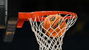 A Wilson EVO Nxt basketball ball with the 2025 NCAA Women's Final Four logo approaches the rim and the net at Amalie Arena.