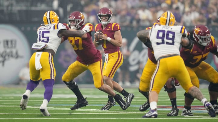 Sep 1, 2024; Paradise, Nevada, USA; Southern California Trojans quarterback Miller Moss (7) drops back to throw the ball against the LSU Tigers in the first half  at Allegiant Stadium. Mandatory Credit: Kirby Lee-USA TODAY Sports