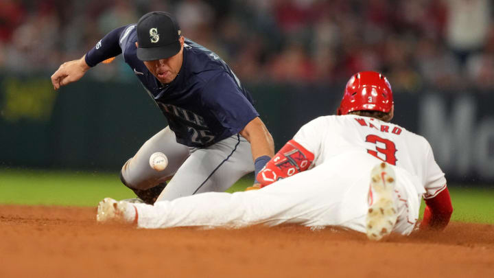 Los Angeles Angels left fielder Taylor Ward slides into second base during a game against the Seattle Mariners on Saturday at Angel Stadium in Anaheim, Calif.