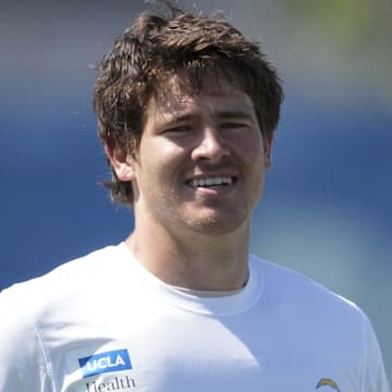 May 20, 2025; El Segundo, CA, USA; Los Angeles Chargers quarterback Justin Herbert (10) looks on during offseason workouts at The Bolt. Mandatory Credit: Kirby Lee-Imagn Images