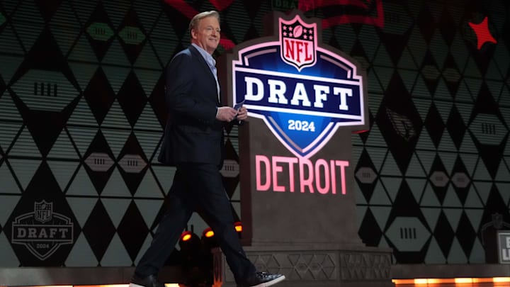 NFL commissioner Roger Goodell walks on the stage during the 2024 NFL Draft at Campus Martius Park and Hart Plaza.