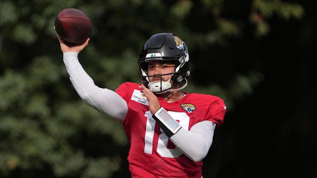 Oct 17, 2024; Watford, United Kingdom; Jacksonville Jaguars quarterback John Rhys Plumlee (18) throws the ball during practice at The Grove. Mandatory Credit: Kirby Lee-Imagn Images