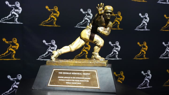 Jan 7, 2024; Houston, TX, USA; A Heisman Trophy at the College Football Playoff Fan Central at the George R. Brown Convention Center. Mandatory Credit: Kirby Lee-USA TODAY Sports