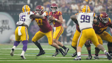 Sep 1, 2024; Paradise, Nevada, USA; Southern California Trojans quarterback Miller Moss (7) drops back to throw the ball against the LSU Tigers in the first half  at Allegiant Stadium. Mandatory Credit: Kirby Lee-USA TODAY Sports