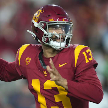 Oct 21, 2023; Los Angeles, California, USA;Southern California Trojans quarterback Caleb Williams (13) throws the ball against the Utah Utes in the first half at United Airlines Field at Los Angeles Memorial Coliseum.