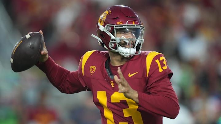 Oct 21, 2023; Los Angeles, California, USA;Southern California Trojans quarterback Caleb Williams (13) throws the ball against the Utah Utes in the first half at United Airlines Field at Los Angeles Memorial Coliseum.