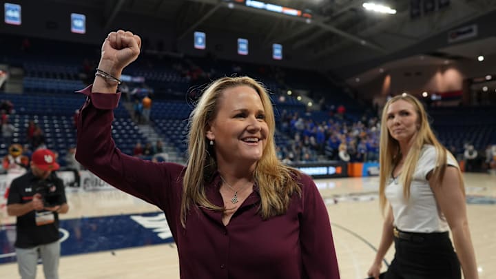 Utah Utes head coach Lynne Roberts celebrates after a game. Utah Utes head coach Lynne Roberts celebrates after a game.