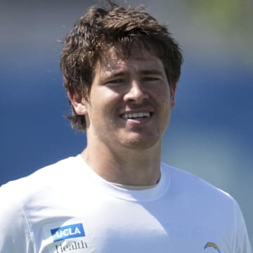 May 20, 2025; El Segundo, CA, USA; Los Angeles Chargers quarterback Justin Herbert (10) looks on during offseason workouts at The Bolt. Mandatory Credit: Kirby Lee-Imagn Images