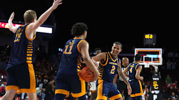 Nov 14, 2023; Los Angeles, California, USA; UC Irvine Anteaters guard Justin Hohn (2)and forward Devin Tillis (11) celebrate at the end of the game against the Southern California Trojans at Galen Center. Mandatory Credit: Kirby Lee-Imagn Images