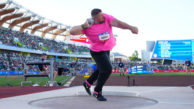 Joe Kovacs throws the shot put in a stadium at the U.S. Olympic Team Trials.