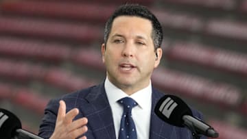 Adam Schefter talks on a set before the 2024 College Football Playoff national championship game between the Michigan Wolverines and the Washington Huskies at NRG Stadium. 