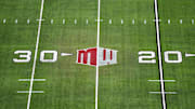 The Mountain West conference logo on the field at Allegiant Stadium. 