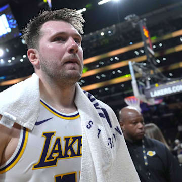 Mar 16, 2025; Los Angeles, California, USA; Los Angeles Lakers guard Luka Doncic (77) reacts after the game against the Phoenix Suns at Crypto.com Arena. Mandatory Credit: Kirby Lee-Imagn Images