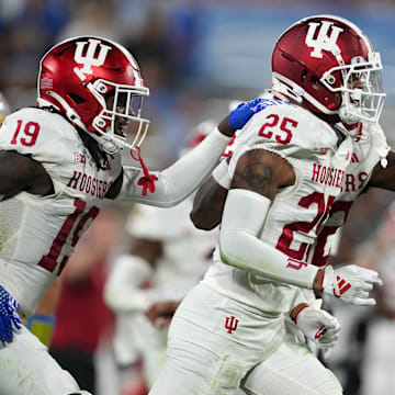 Indiana Hoosiers defensive back Amare Ferrell celebrates with defensive back Shawn Asbury II 