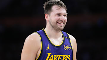 Mar 17, 2025; Los Angeles, California, USA; Los Angeles Lakers guard Luka Doncic (77) reacts against the San Antonio Spurs in the first half at Crypto.com Arena. Mandatory Credit: Kirby Lee-Imagn Images
