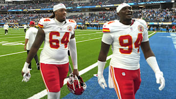 Sep 29, 2024; Inglewood, California, USA; Kansas City Chiefs offensive tackle Wanya Morris (64) and defensive end Malik Herring (94) leave the field after the game against the Los Angeles Chargers at SoFi Stadium. Mandatory Credit: Kirby Lee-Imagn Images