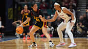 Mar 10, 2024; Las Vegas, NV, USA; Southern California Trojans guard Kayla Padilla (45) dribbles against Stanford Cardinal guard Chloe Clardy (13) jn the first half of the Pac-12 Tournament women's championship game at MGM Grand Garden Arena. Mandatory Credit: Kirby Lee-Imagn Images