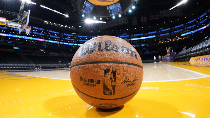 A Wilson official NBA game ball on the court at Crypto.com Arena.