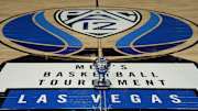 Mar 16, 2024; Las Vegas, NV, USA; The 2024 Pac-12 Conference men's basketball champion trophy at center court on the Pac-12 logo at T-Mobile Arena. Mandatory Credit: Kirby Lee-Imagn Images