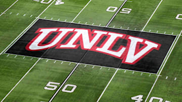 The UNLV Rebels logo at midfield during the Mountain West Championship at Allegiant Stadium. Mandatory Credit: Kirby Lee-Imagn Images