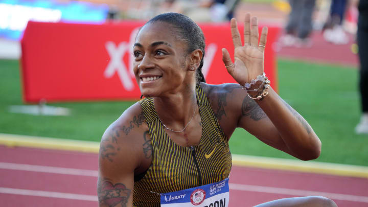 Sha'Carri Richardson celebrates after winning the women's 200m heat.