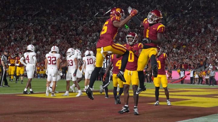 Sep 9, 2023; Los Angeles, California, USA; Southern California Trojans wide receiver Zachariah Branch (1) celebrates with Southern California Trojans wide receiver Dorian Singer (15) after a touchdown in the first half at United Airlines Field at Los Angeles Memorial Coliseum. Mandatory Credit: Kirby Lee-USA TODAY Sports