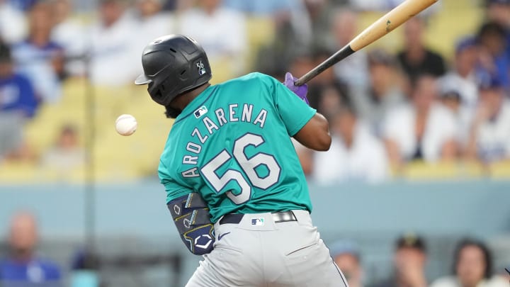 Seattle Mariners left fielder Randy Arozarena is hit by a pitch against the Los Angeles Dodgers on Wednesday at Dodger Stadium.