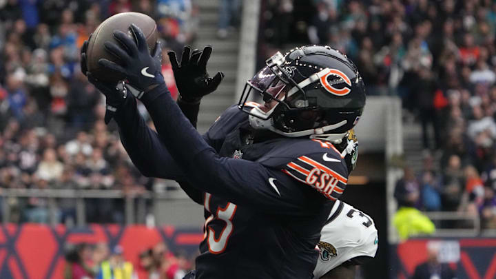 Oct 13, 2024; London, United Kingdom; Chicago Bears wide receiver Keenan Allen (13) catches a three-yard touchdown pass against Jacksonville Jaguars cornerback Montaric Brown (30) in the second half during an NFL International Series game at Tottenham Hotspur Stadium. Mandatory Credit: Kirby Lee-Imagn Images Oct 13, 2024; London, United Kingdom; Chicago Bears wide receiver Keenan Allen (13) catches a three-yard touchdown pass against Jacksonville Jaguars cornerback Montaric Brown (30) in the second half during an NFL International Series game at Tottenham Hotspur Stadium. Mandatory Credit: Kirby Lee-Imagn Images