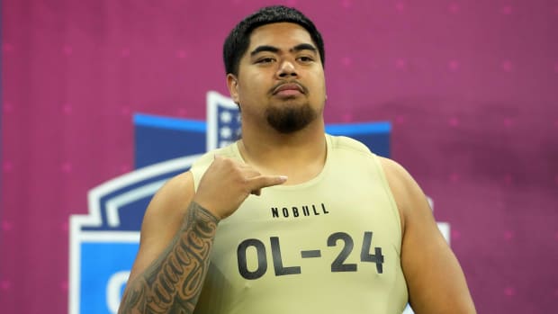 Oregon State offensive lineman Taliese Fuaga (OL24) poses during the 2024 NFL Scouting Combine.