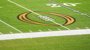 Dec 30, 2022; Glendale AZ, USA; The College Football Playoff logo on the field at State Farm Stadium, the site of the 2022 CFP Semifinal between the TCU Horned Frogs and the Michigan Wolverines and Super Bowl 57 (LVII). Mandatory Credit: Kirby Lee-Imagn Images