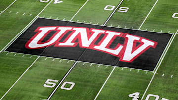 The UNLV Rebels logo at midfield during the Mountain West Championship at Allegiant Stadium. Mandatory Credit: Kirby Lee-Imagn Images