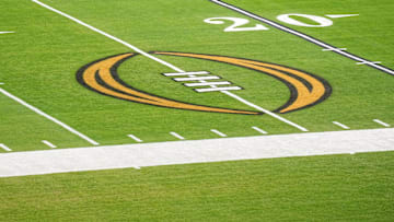 Dec 30, 2022; Glendale AZ, USA; The College Football Playoff logo on the field at State Farm Stadium, the site of the 2022 CFP Semifinal between the TCU Horned Frogs and the Michigan Wolverines and Super Bowl 57 (LVII). Mandatory Credit: Kirby Lee-Imagn Images