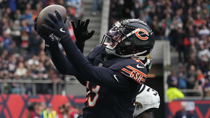 Oct 13, 2024; London, United Kingdom; Chicago Bears wide receiver Keenan Allen (13) catches a three-yard touchdown pass against Jacksonville Jaguars cornerback Montaric Brown (30) in the second half during an NFL International Series game at Tottenham Hotspur Stadium. Mandatory Credit: Kirby Lee-Imagn Images Oct 13, 2024; London, United Kingdom; Chicago Bears wide receiver Keenan Allen (13) catches a three-yard touchdown pass against Jacksonville Jaguars cornerback Montaric Brown (30) in the second half during an NFL International Series game at Tottenham Hotspur Stadium. Mandatory Credit: Kirby Lee-Imagn Images