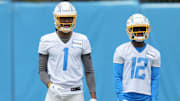 May 12, 2023; Costa Mesa, CA, USA; Los Angeles Chargers receiver Quentin Johnston (1) and receiver Derius Davis (12) during rookie minicamp at Hoag Performance Center. Mandatory Credit: Kirby Lee-Imagn Images