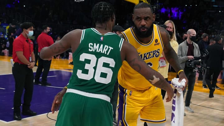 Boston Celtics guard Marcus Smart (36) and Los Angeles Lakers forward LeBron James (6) embrace after the game at Staples Center. The Lakers defeated the Celtics 117-102.  Mandatory Credit: