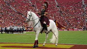 Sep 2, 2023; Los Angeles, California, USA; Southern Calfiornia Trojans white horse mascot Traveler with female rider Dana Kanstu during the game against the Nevada Wolf Pack United Airlines Field at Los Angeles Memorial Coliseum. Mandatory Credit: Kirby Lee-Imagn Images